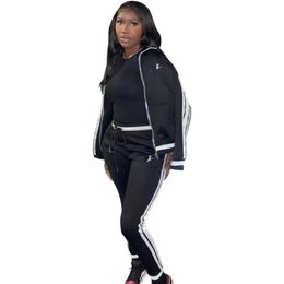 Zwart gestreepte splice tweedelig set tracksuits voor vrouwen front zipper lange mouw jas top knie lengte jogger pant casual outfit
