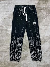 pantalones de chándal negros pantalones de chándal para hombre pantalones de chándal holgados cintura elástica revestida y cremalleras con cordón bolsillos decoración de letras pantalones casuales gruesos Hip-hop