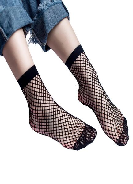 Negro Blanco Sexy Mirada a través de Wild Fishnet Hollow Media pantorrilla Moda Calcetines cortos Women039s Accesorios de ropa 7336375