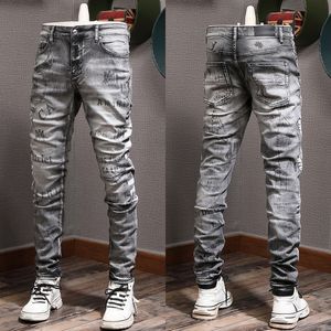 Zwart grijze jeans voor heren met vintage slim fit pijpen met wassing en print