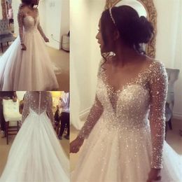 Bling Bling Illusion manches longues robe de mariée princesse 2020 décolleté transparent bijou perles de cristal une ligne taille empire africain Weddi256m