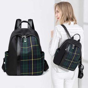 Blocking Color Plaid sac à dos pour femmes printemps 2024 Version coréenne Facile à porter un sac de voyage en tissu oxford de grande capacité