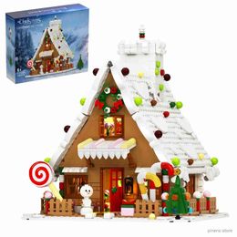 Bloques 1090 Uds. Año nuevo invierno LED ciudad Navidad casa de pan de jengibre bloques de construcción nieve muñeco de nieve cabaña luz ladrillo juguete niños regalos de Navidad