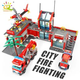 Blocs HUIQIBAO 774 pièces caserne de pompiers modèle de construction camion hélicoptère pompier briques ville jouets éducatifs pour enfants cadeau 231020 meilleure qualité