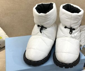 Botas de esquí de soplado zapatos de clima frío invernal invernal acolchado nylon tobillo botas de nieve diseñador de lujo moda eadrawn 221365840