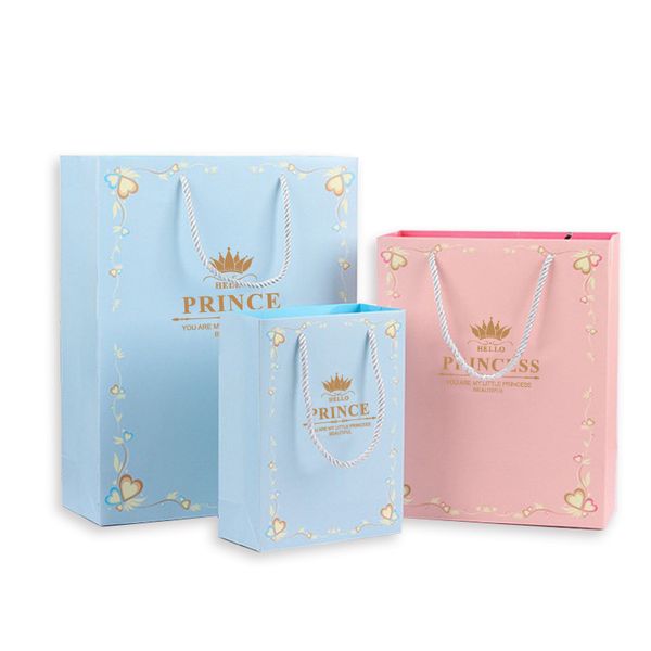 Bolsas de papel de regalo de baby shower azul y rosa regalos para el día de los niños Bolsa de almacenamiento con manijas de juguete o paquete de ropa para niños Príncipe y princesa