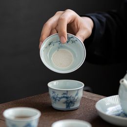 Récitères en porcelaine bleue et blanche filtre Plum à la main Plum Blossom Filtre de thé Écran de thé du tarif