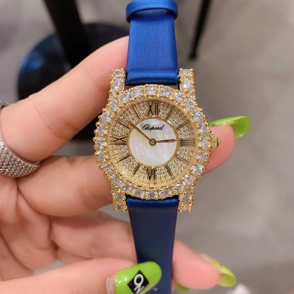 Reloj de mujer de acero inoxidable a la moda con globo azul, cristal de zafiro, correa plateada qc con incrustaciones de diamantes importados