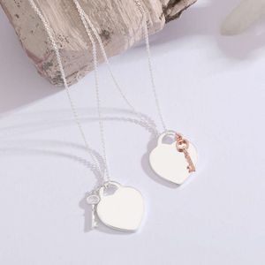 Boîte bleue Classicdesigner Tiff Collier Top TF Di Collier Boutique Bijoux Saint Valentin Cadeau Amour Pendentif En Forme De Coeur Carte Clé Haute Cadeau De Noël