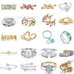 Blue Box TF Classicdesigner Tiff Ring Top Fashion T Home Sterling Sier Hartvormige Leaf Knot Drip Glue Ring met vergulde diamant Tee-sieraden