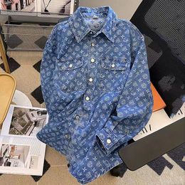 Blue denim shirt jas dames losse 2024 lente en herfst nieuw ontwerp sense de Koreaanse versie van de leeftijdsvermindering van Joker Jacquard Top.