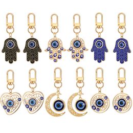 Blue Evil Eye Keychain alliage Righestone Palm Palle Pendre Key Ring Femmes Men Colorful Hollow Moon Coeur Charmes Lobster Backle Sac Car Clé ACCESSOIRES