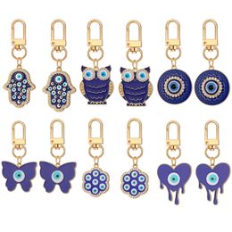 Blue Evil Eye Keychain Heart Butterfly Owl Pending Key Ring Mujeres Hombres Colorido de animales Encantos Langosta Bolsa Bolsa Carretería Accesorios