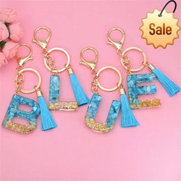 Porte-clés à pompon bleu, cristal bleu ciel, or, sables mouvants, pendentif à breloque, accessoires exquis et mignons, Alphabet, cadeau