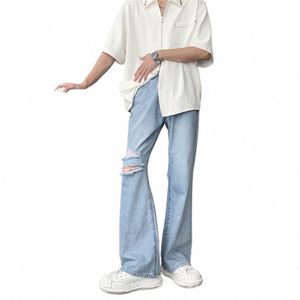 Bleu Mer Destroyed Jeans évasés Pantalons Hip Hop Graffiti Ripped Jeans pour hommes Femmes Streetwear Vintage Patchwork Jeans larges L92h #