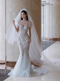 Vestidos de novia de sirena de diamantes bohemios con hombros descubiertos 2024 con lentejuelas y tallas grandes Vestidos de novia con cristales de barrido Tren Vestido de sirena con cuentas de lujo