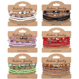 Bracelet multicouche de style bohème avec des yeux à la mode et à la combinaison de combinaison de verre de perle de riz pour femmes à la mode et polyvalente