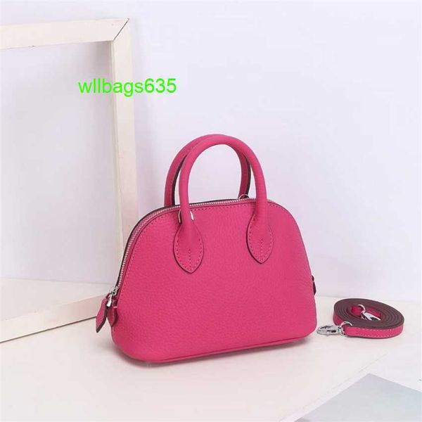 Sac à main en cuir bolide sacs de luxe de luxe sacs 2024 Nouveau couche enveloppe de coquille 18 cm Couche de vache de vache litchi Mini Bowling Ball Handheld Geni Have Logo Hbomu5