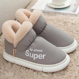 Bottes en peluche d'hiver femmes pantoufles masculines au sol unisexe des chaussures de plate-forme épais