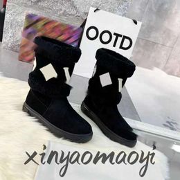 Botas UGGit Snowdrop Diseñador Zapatos de mujer Botas de piel de invierno Botas de cuero cálidas Bota de nieve Tobillo Marrón Negro Zapato peludo Lujo al aire libre