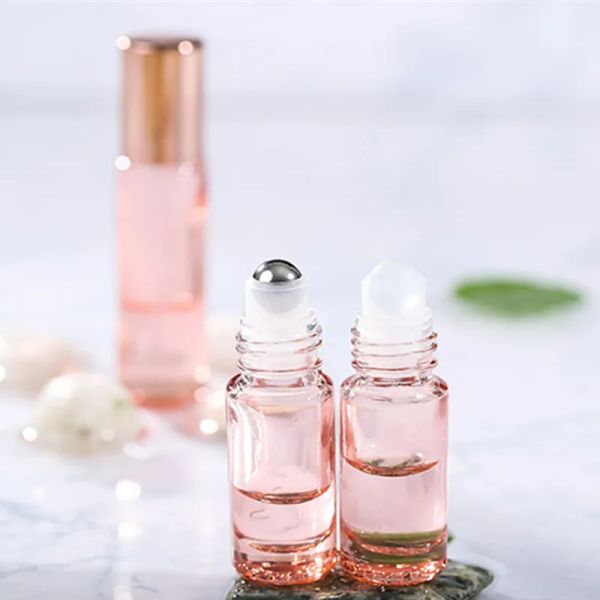 Bouteille 12 pièces/lot 5 ml/10 ML or Rose rouleau sur bouteille en verre épais flacons d'huile essentielle de parfum vides avec bille roulante en acier inoxydable