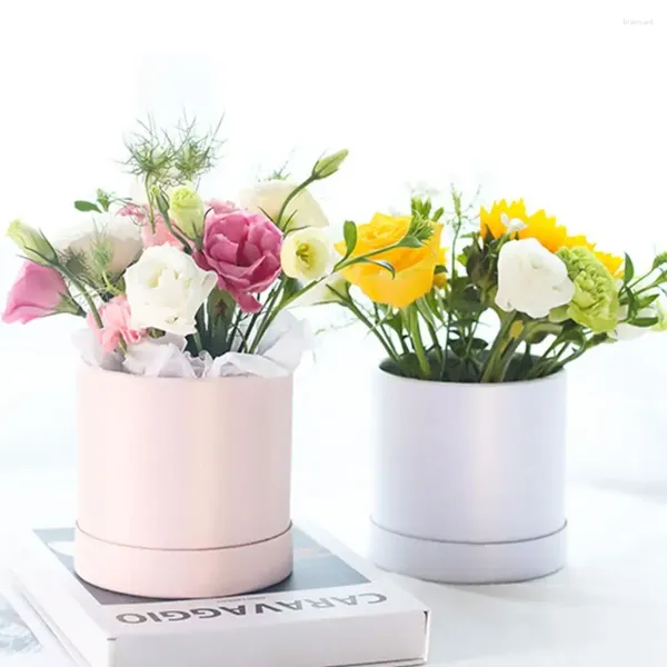Bouteilles en carton petit bouquet floral rose rangement de fleurs