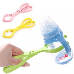 Flessen # Antislip Baby Soep Feeder Melk Houder Clip Handige Zuigfles Pusher Plastic Sterilisatie Gift G220612