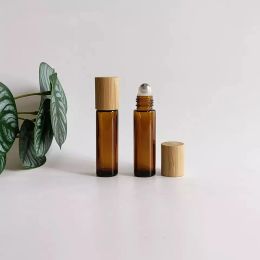 Bouteilles en gros vide 10 ml de verre ambre rond Rouleau d'huile eaaentielle sur bouteille avec rouleau en acier bambou couvercle recharge esthétique récipient cosmétique