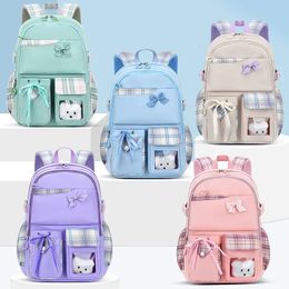 Bowknot Schoolbag pour les adolescentes sac à dos orthopédique de grande capacité avec sacs d'école de pendentif de dessins animés 2 taille de taille 240314