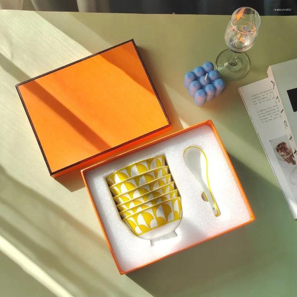 Bols européen léger luxe maison en céramique bol soleil six cuillères en os de la Chine à haut niveau d'apparence cadeau jaune