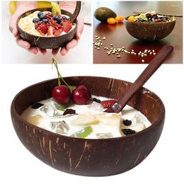Kommen Natuurlijke kokosenkom en lepel creatieve houten fruitsalade Coco smoothie ramen mixen gezond dieet servies