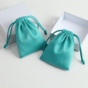 Cajas 50 piezas de joyas de franela Bolsa de regalo de 8x10 cm Velvet Drawstring Pouch de Navidad Candio Favor Bag Jewellry Business