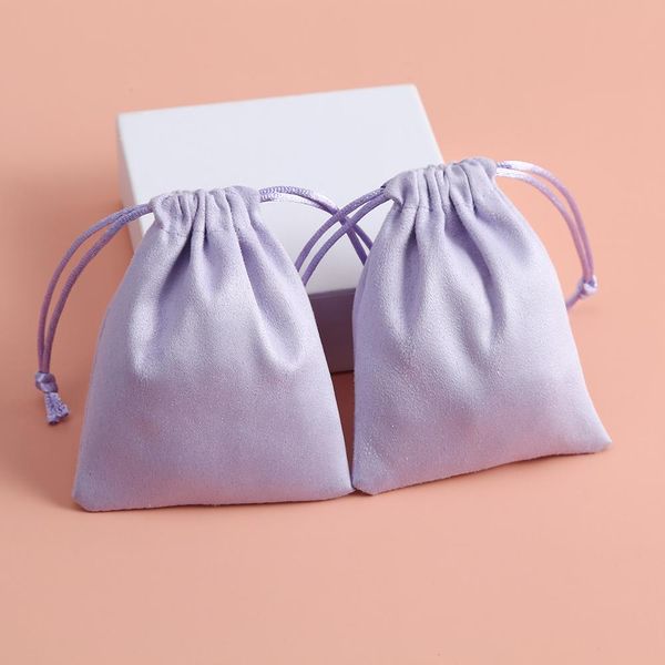 Boîtes 50pcs sac à bijoux en velours violet petite pochette emballage d'affaires flanelle cordon de serrage boucles d'oreilles sacs cadeaux peuvent être personnalisés