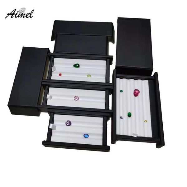 Cajas Caja de almacenamiento de joyería de gema de calidad con exhibición de diamantes de groove escaparate de la pantalla del organizador de piedra PU Caja de transporte Caja blanca negra