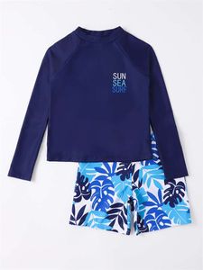 Boy Swimsuit 2024 Nouveau éléments longs à manches longues solides Souilles de maillot de bain Summer Shorts de plage de plage