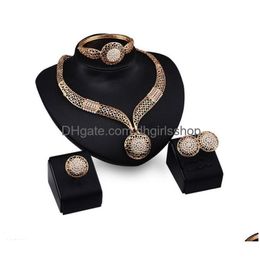 Bracelet boucles d'oreilles collier exagéré strass bijoux métal évider boucle d'oreille et bracelets dans un ensemble en gros goutte livrer Dhqgj