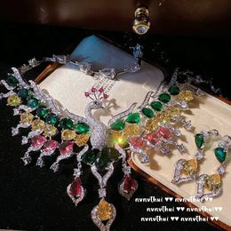 Bracelet boucles d'oreilles collier de luxe 925 ensemble de bijoux en argent scintillant Zircon élégant multicolore paon boucle d'oreille femmes mariage Banquet 231127