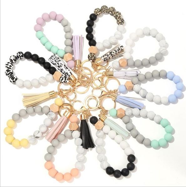 Pulsera Llaveros PU Borla de cuero Llavero Grado alimenticio Pulseras de cuentas de silicona Llavero Joyería de moda Favor de fiesta 9 Diseños Venta al por mayor BT6602