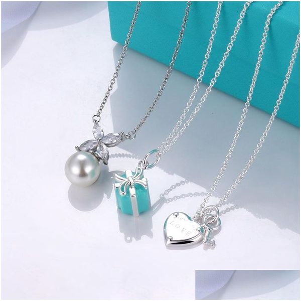 Bracelet Collier Amour Clé Conception Femme T Maison Coffret Cadeau Coeur De Pêche Arc Perle Pendentif Clavicule Chaîne Drop Livraison Ensembles De Bijoux Dhm0P