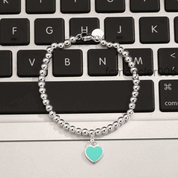 Pulsera t Familia Plata de ley S925 Luz de lujo Amor Marca Pulsera Ins Estilo Simple Melocotón Corazón Cadena Diseñador Joyería para mujeres WFFD