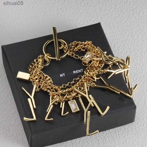 Bracelets Bracelet de créateur pour femmes Bracelet de luxe Designer pour femmes boucle en fer à cheval à la mode chaîne élégante de perles cristal multi-métal 240228