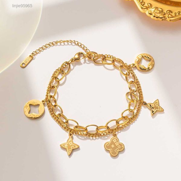 Diseñador de pulseras para mujer Encanto de oro Estilo de moda Mujer Brazalete Pulsera Cadena de brazalete Joyería 18k Chapado en acero inoxidable Regalo de los amantes de la boda