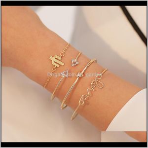 Bracelets Drop Livrot 2021 4pcs Golden Color Girls Bangles Set Love Cactus Crystal Triangle Bangle Geométrie Bracelet Design For Women Jewel