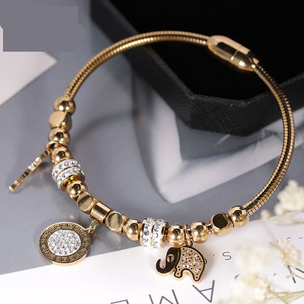 pulseras La pulsera de acero de titanio no se desvanece, prevención de alergias Pulsera de múltiples elementos de acero inoxidable de moda al por mayor con imán de diamantes de titanio