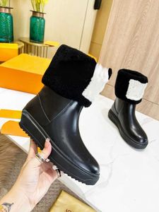 Merklaarzen Designer Design Sheepskin en Fur Snow Boots Dames Wintermode om een ​​warm nieuw dikke anti -skid medium te houden