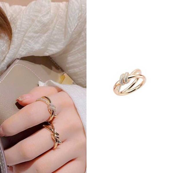 Anillo de nudo de estilo estrella de la marca con encanto con luz de apertura de oro chapado en rosa lujo y arco de nicho decoración elegante simple