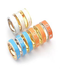 Marque Close Color Epoxy Designer Ring Fashionable Men and Women Couple Anglers de mariage de haute qualité en acier inoxydable MIDI JEWE4135922