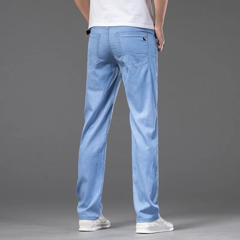Merkkleding zomer lyocell jeans mannen dun los rechte rek denim broek lichtblauwe klassieke broek groot formaat 40 42 44 44