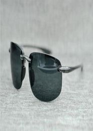 Designer de marque McY Jim 407 Lunettes de soleil de haute qualité Polarise Rimless Lens Men Femmes conduisant des lunettes de soleil avec Case5424144
