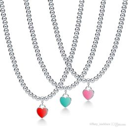Brand Designer Style Collier de pendentif coeur de marque célèbre vendant des colliers de chaîne de chaîne de nectarine en émail vert rouge rose rouge 3131
